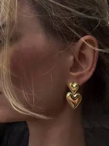 “Heart to heart” earrings