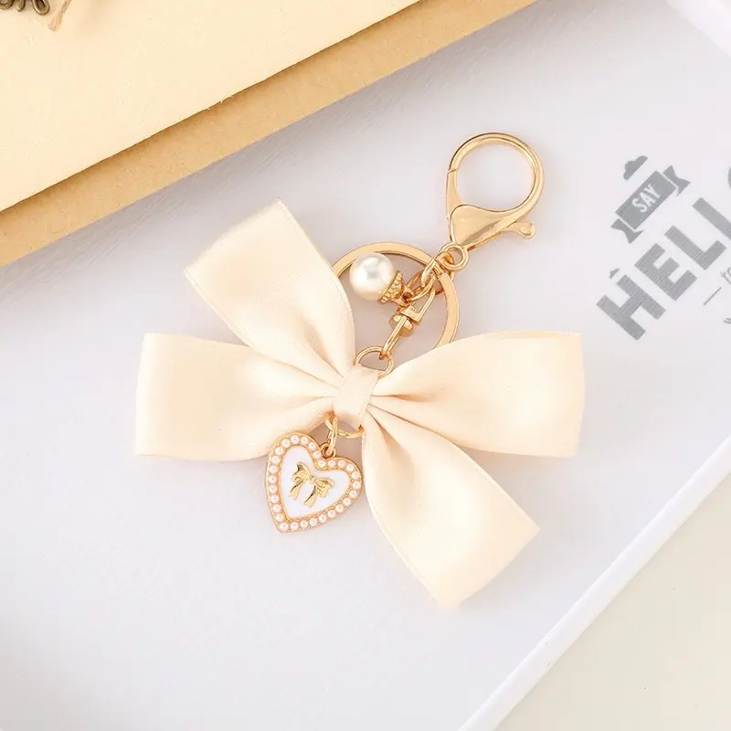 Bow Knot Bag Pendant Keychain with Elegant Pearl Heart Charm and Satin Ribbon for Stylish Accessories