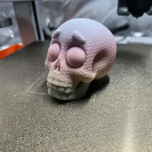 Glow in the dark rainbow knitted skull