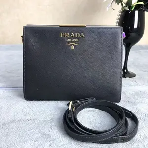 Pre-owned PRADA leather Clutches & Wristlets Saffiano Crossbody Bag A802