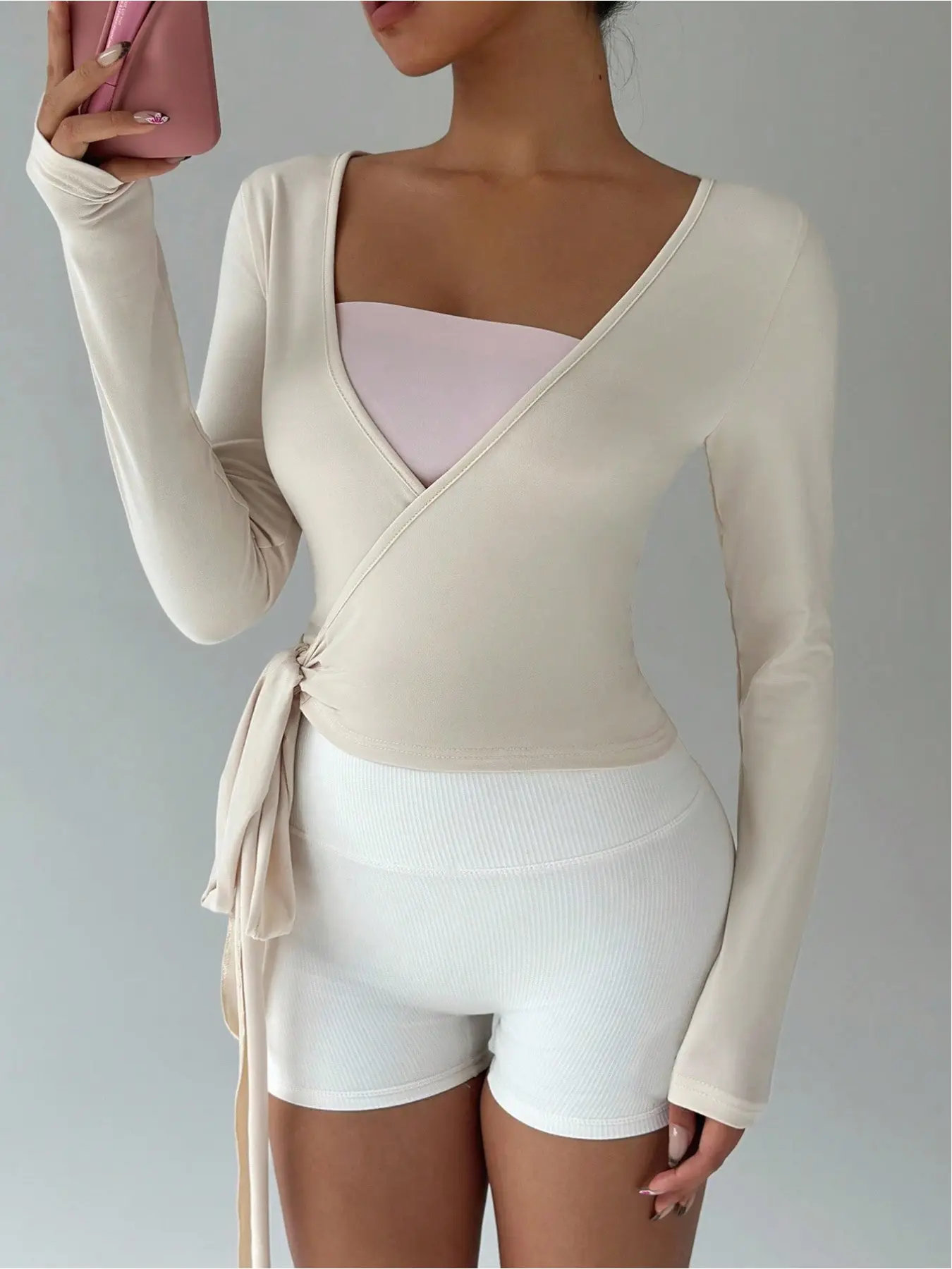 Women's Multicolor Yoga Fitness Front-Tie V-Neck Long Sleeve Cropped Tee, a minimalist and elegant essential for spring and autumn seasons.