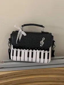 Retro piano bag embroidered messenger shoulder bag, niche design personality classic casual versatile shoulder bag, literary music theme shoulder bag, Casual messenger bags, fashionable patterned bag, suitable for daily commuting, shopping and travel.