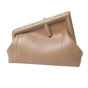 Pre-owned FENDI leather Clutches & Wristlets Python Small First Mud Clutch Bag in Luxurious Beige Python with Gold Accents