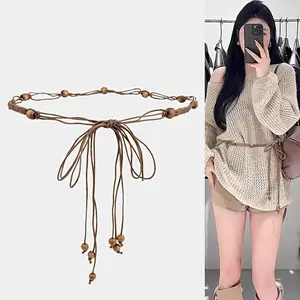 This new bohemian-style woven belt is an ethnic-inspired clothing accessory. A versatile beaded waist chain, it pairs well with dresses, sweaters, and trousers. Features delicate tassel embellishments and makes a perfect Mother's Day gift.