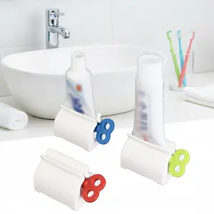 No-Install Toothpaste Squeezer with Strong Adhesion Roller, 360° Rotation for Full Squeeze, Non-Slip & Waterproof Holder, Bathroom Countertop Organizer for Tubes.