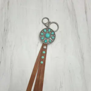 NKY250121-55               Silver metal and blue turquoise stone with brown leather Key chain