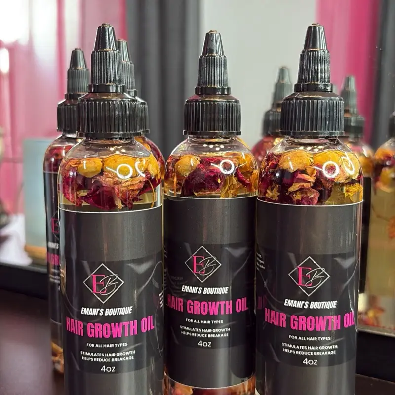 Emani’s Boutique All Natural Hair Oil. Made with all natural oils that enhance and promotes hair growth. infused with rose petals for elegance. Roses are known for. their health benefits, such as hydrating the skin.
