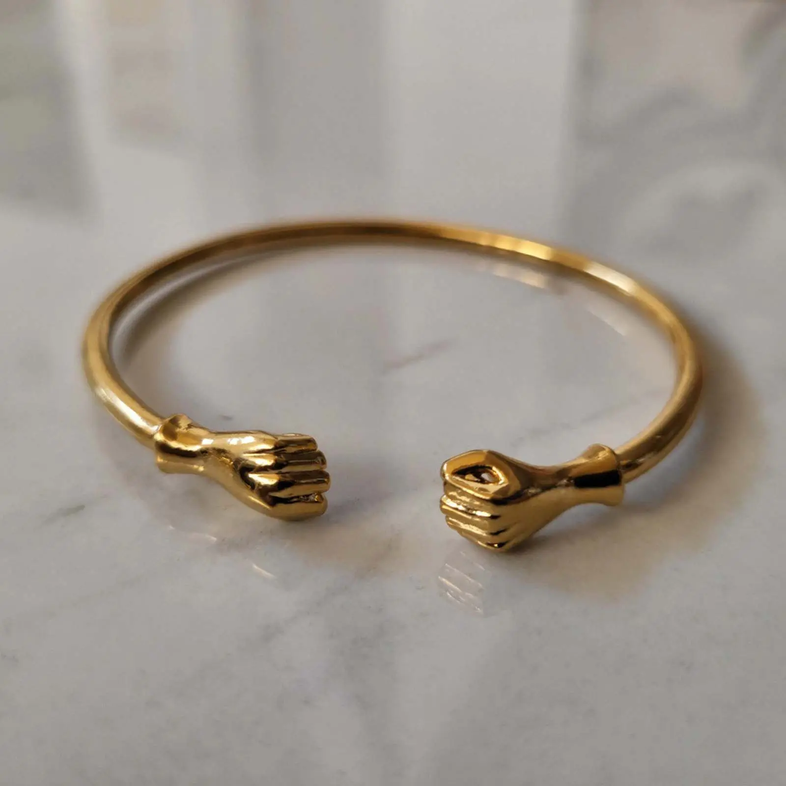 Modern Geometric Cuff Bracelet for Women, Elegant Alloy Statement Jewelry with a Golden Finish, Lightweight & Adjustable for Casual Daily Wear, Unisex, Everyday Wear, Bracelet Wristband, Fashionable Jewelry, Adjustable Open, Bold Symbolism, Fist-Inspired,