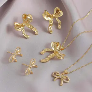 Bow necklace set golden inlaid zircon hammer pattern irregular bow