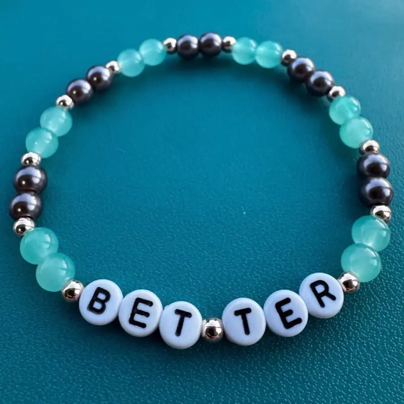 Bet ter. Beaded friendship bracelet.