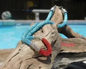 Dequa Tyre Necklace - Hand-Crocheted Tri-Color Beads in Blue Gold and Red 18 Inches Long Vibrant Handmade Jewelry for Casual and Formal Occasions