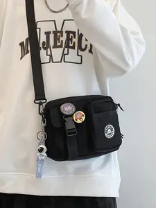 Unisex couple's small square bag with random color badge decoration, multi pocket single shoulder casual crossbody bag with pendant