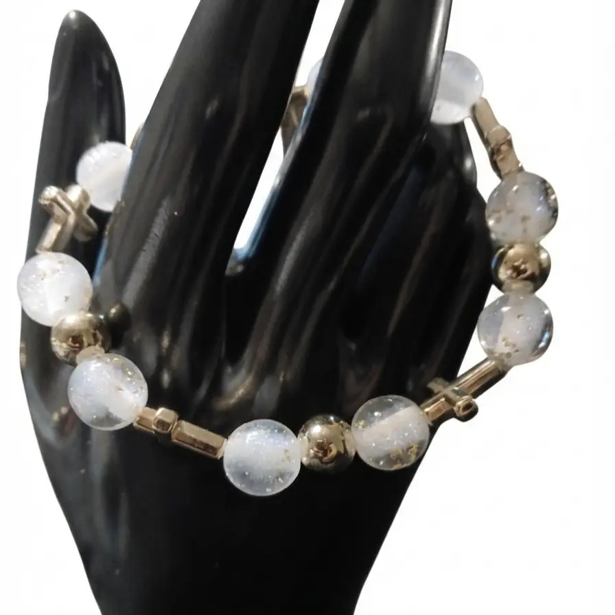 Celestial Sparkle: Handcrafted White Glitter and Gold Cross Bracelet