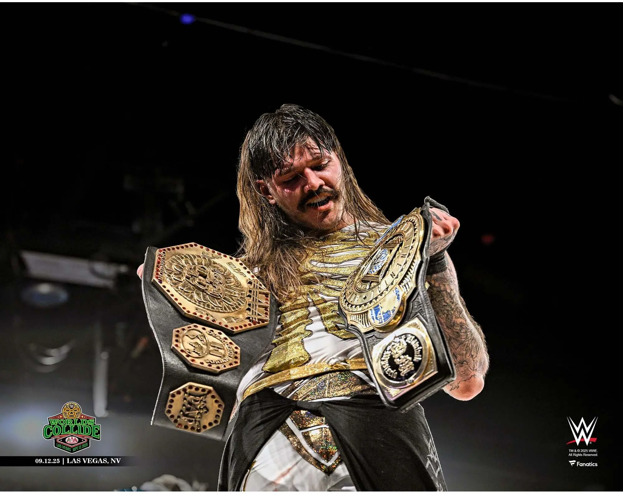 Dominik Mysterio WWE Unsigned AAA Worlds Collide Holding Both Titles Photograph - Wrestling Memorabilia