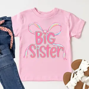 "Big Sister" T-shirt with ribbon bow design: Soft cotton material for comfortable movement Top