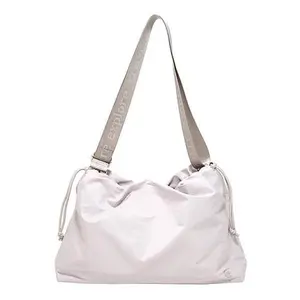 Samantha Brown Sleek Drawstring Crossbody Bag
