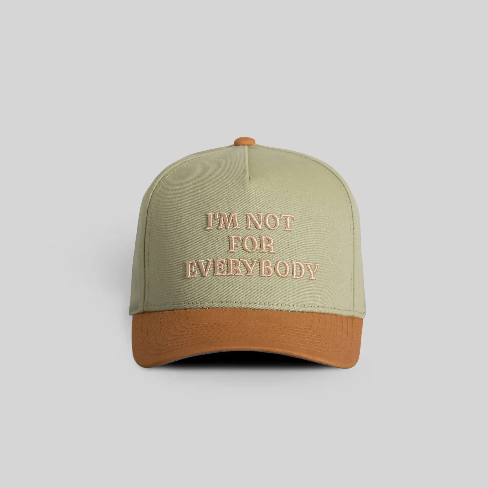 on I'm Not For Everybody Twill Trucker Hat Sage | trucker hat | twill | snapback | adjustable | embroidered | casual | unisex | wheat | dad hat | streetwear | outdoor | sports | Trendy Hat 2026 | Streetwear Headwear | Fashion Cap | Summer Hat