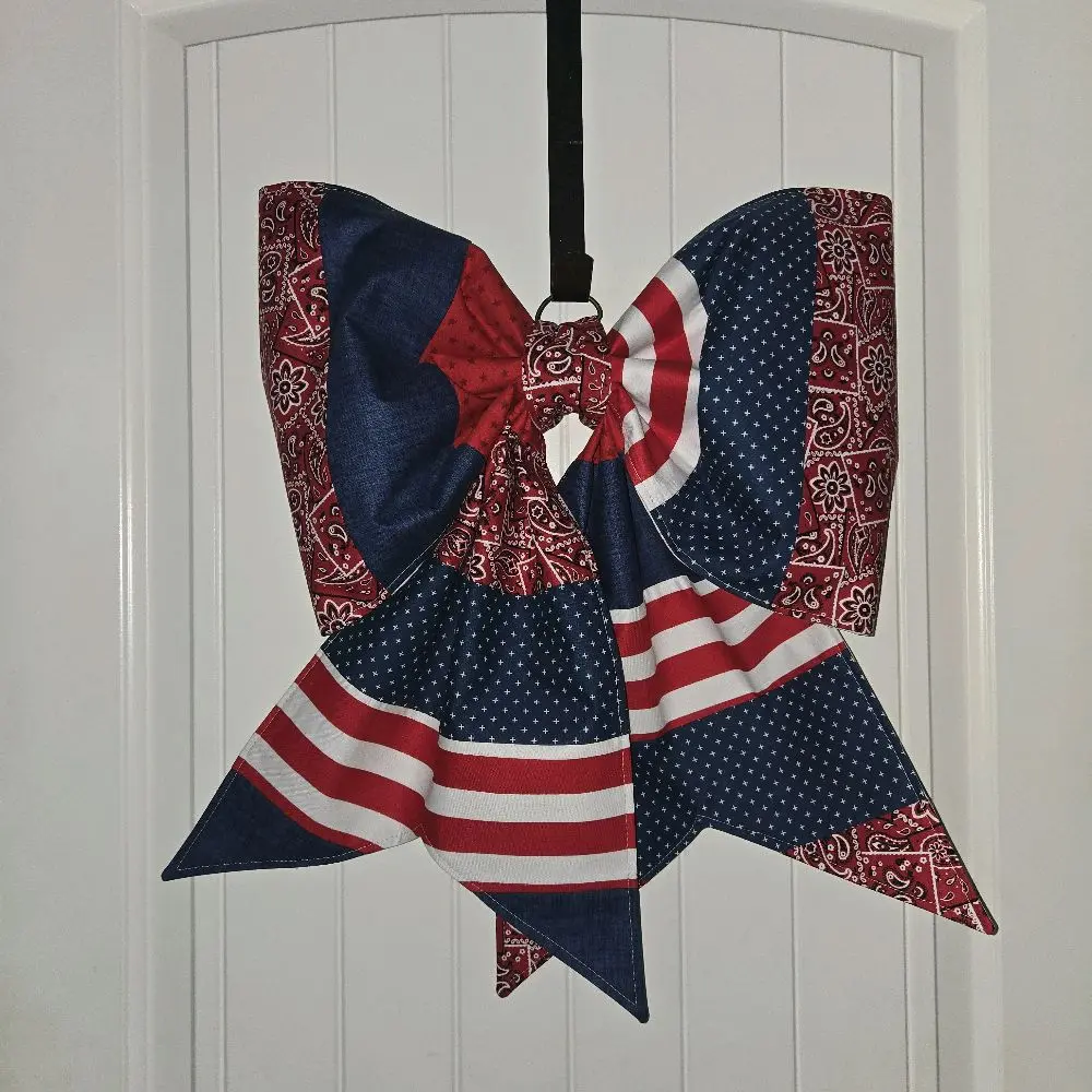 Reversible door bow