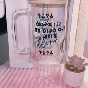 Carin Leon Fan 40 oz Glass Can with Unique Spanish Text Design