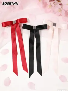 Satin Ribbon Magnetic Bow Hair Clip: A Heartthrob Choice for Atmosphere Girls. The red, black, and white satin bow hair clips come with a lively and flowing feel. No matter what hairstyle you have, they can instantly enhance the layering of your look, eas