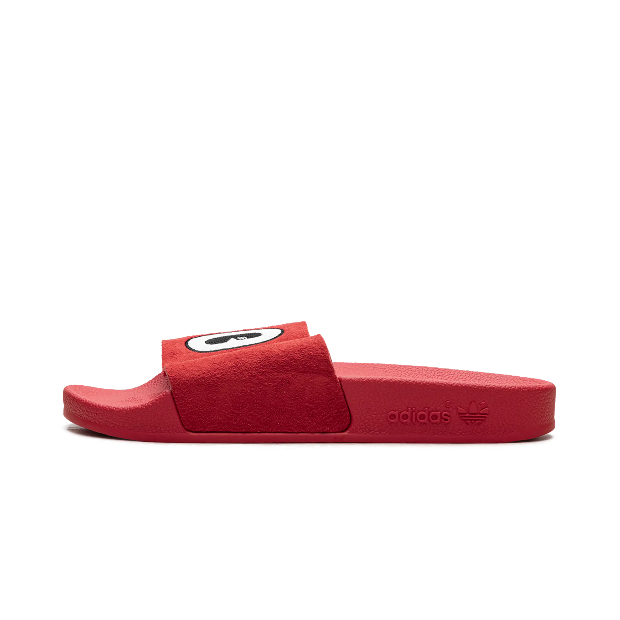 Adilette Suede Slide WMNS "Cartoon Eye" CM8412