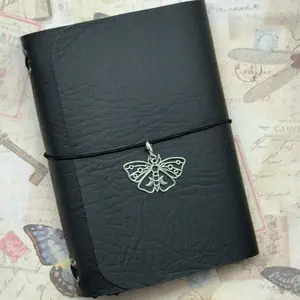 A6 Traveler Journal with notebook, reusable sticker book, black page notebook, and planner - moth clip charm - Refillable