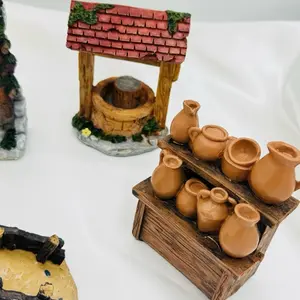 Hand Painted 4 Piece Resin Nativity Village with Water Well & Bridge Elegant Christmas Decor for Home Traditional Holiday Statue