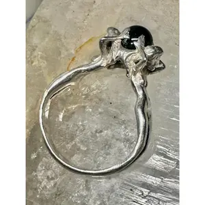 Nude ladies ring holding an onyx world globe size 7.50 sterling silver women