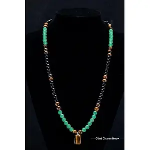 Lucky charm necklace, featuring green aventurine and tiger's eye pendants, has healing properties and is suitable for anniversaries, vacations, and themed parties.It is a jewelry piece that brings abundant wealth.Crystal bracelet, long chain, sweater chai