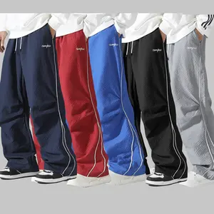 5PCS Men's Campus Print Wide Leg , Elastic Waist Drawstring Streetwear Joggers,  Bubble Textured Loose Fit Trousers with Side Stripes, Lightweight Breathable  for Daily Wear, 5 Pack Mens