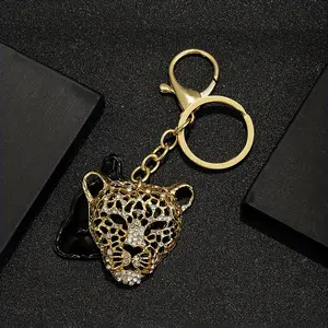 Elegant Two-Tone Leopard Head Keychain with Rhinestones - Durable Zinc Alloy, Fashionable Hollow Design, Perfect for Couples' Accessories, Stylish Key Holder | Rhinestone Embellished | Durable Construction