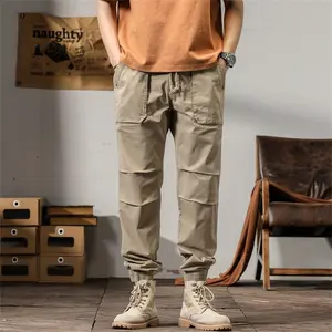 Men's solid color casual fashion with personalized pockets with hemp rope style adjustable elastic drawstring back button pockets with pleated design cuff work cargos Menswear Pants Plain pantalones para hombre cargopantsmen durable fabric tactical daily