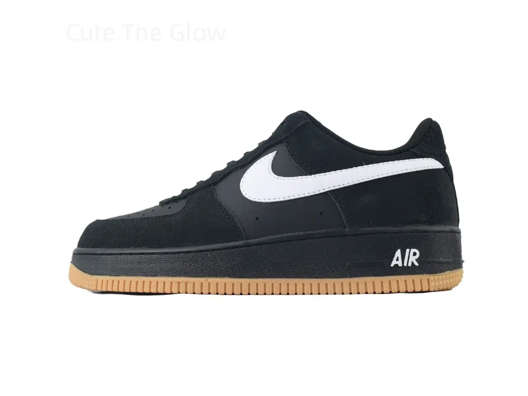 Full black suede low top skate sneakers, bold off-white stitched side logo, vintage tan gum rubber outsole, unisex dark trainers fit old school hip-hop, skate culture and underground street daily outfits