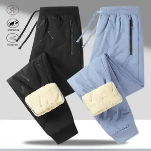 Two pairs of fleece lined casual pants, exploring warm styles for autumn and winter, with drawstring designs convenient for adjusting waist size during outdoor explorations in autumn and winter. The fleece lining provides warmth and practicality, showcasi