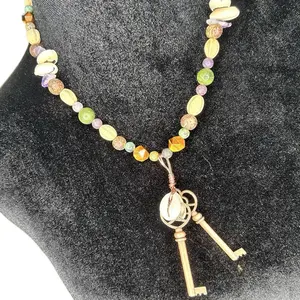 Handmade Copper Keys on Gemstone and Seed Beaded Necklace Featuring Acai Seeds Marbiney Jade Lepidolite Tiger Eye Amethyst Cowrie Shells and African Turquoise