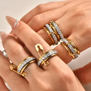 Women's multi-layered zircon rings, interlocking stacking rings, statement rings, mixed metal stacking rings, and two-tone zircon stacking jewelry.