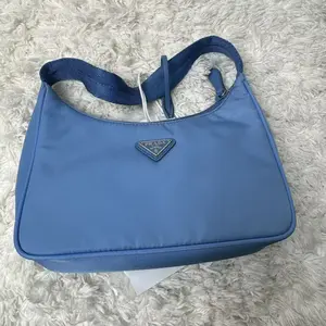 Pre-owned PRADA Nylon Mini Bags Re Edition 2000 Mini Bag in a blue shade