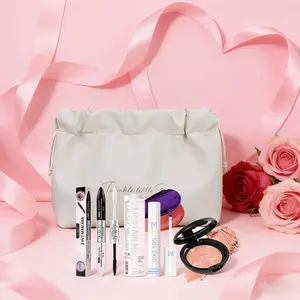 A makeup set that includes a cosmetic bag, portable for travel; it contains dual-ended mascara, color-changing lip gloss, pressed powder, and powder puffs, plus a white makeup bag. Surprise gift, gift box, perfect pressed powder curated set.