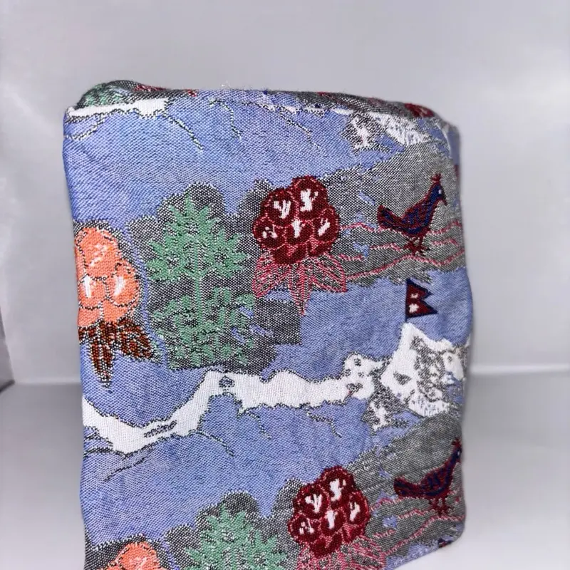 Nepal Embroidered Dhaka Topi with Vibrant Landscape Design and Unique Bird Motifs