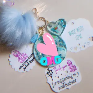 Pastel Blue Round Glitter Keychain with Blue Heart Charm, Includes Pom Pom, Keychain with Blue Heart Charm and Heart Design