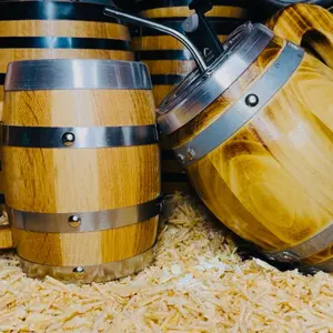 Carnales Promo 1 16oz oak & 1 16oz cedar mug with lid and straw. Thermal barrel mugs perfect for keeping your favorite drink cold longer. Take advantage of our free engraving and personalize them. This rustic mugs will elevate your drinking experience.