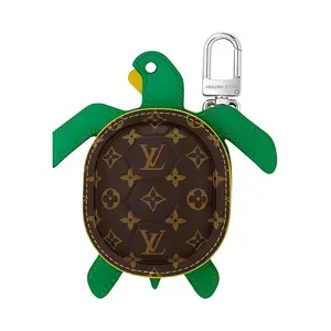 Louis Vuitton Turtle Pouch with Monogram Zipper in Green and Brown Leather for Men and Women as Keychain, Coin, and Earphone Case