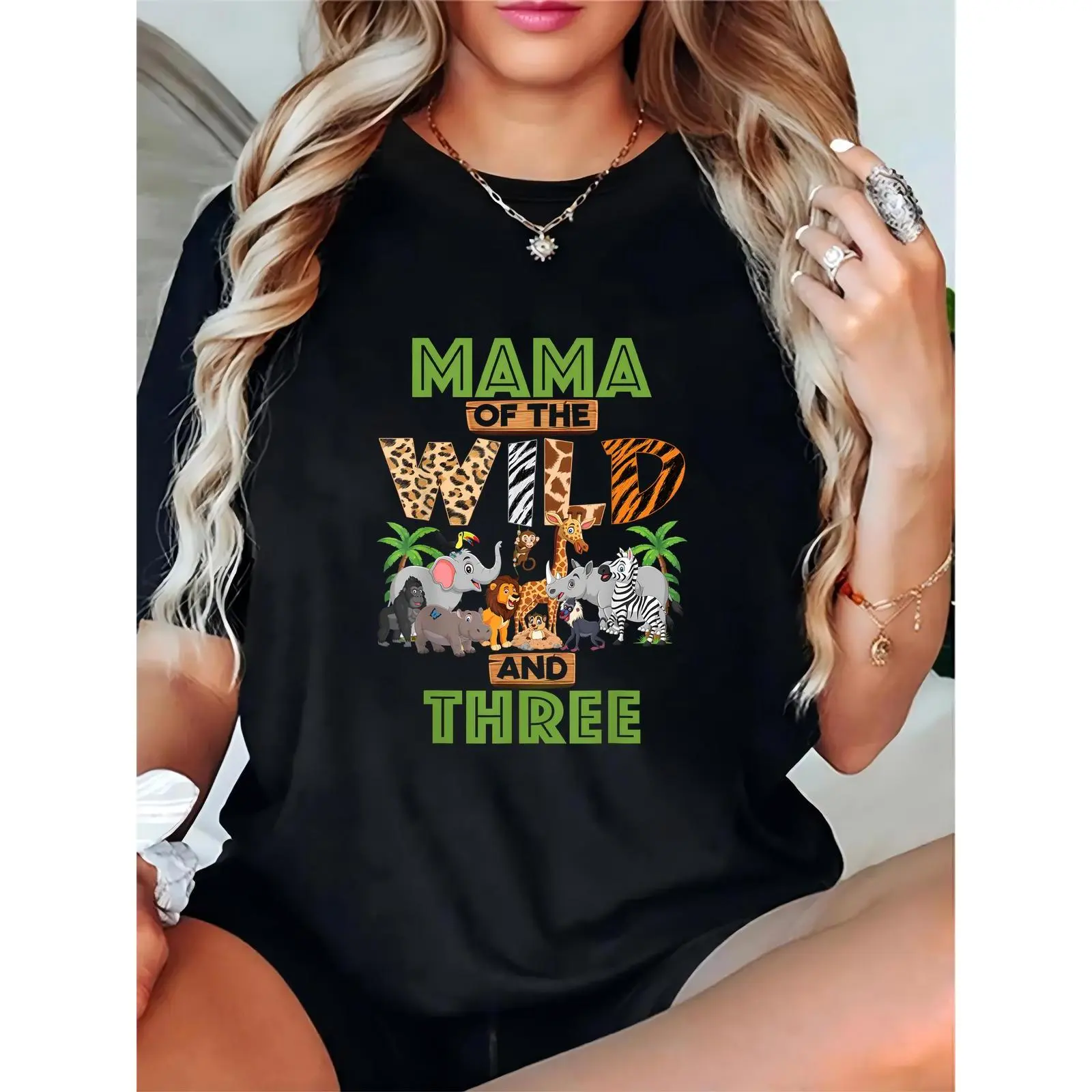 Women's "Mama of the Wild & Three" Jungle Safari Animals Graphic T-Shirt - Casual Mom Outfit for Zoo Trips, Family Vacations & Animal Enthusiasts 100% Cotton T-shirt
