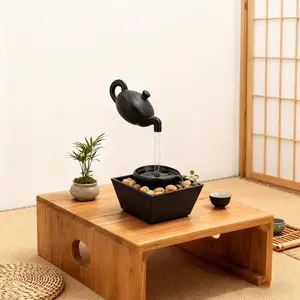 Zen-inspired teapot fountain lamp, featuring soothing LED light and flowing water - black resin relaxation fountain, with pebble base, suitable for home/office decoration, meditation assistance, a warm light gift