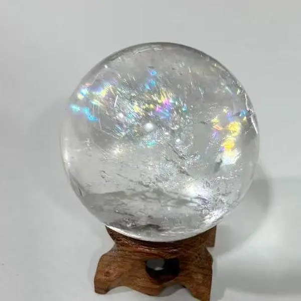 Clear Quartz Sphere with Natural Rainbow Inclusions Clear Quartz Sphere with Natural Rainbow Inclusions