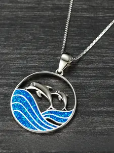 A unique, stylish, platinum-blue, synthetic Opal Dolphin Round Wave Women's Necklace that exudes elegance and versatility.
