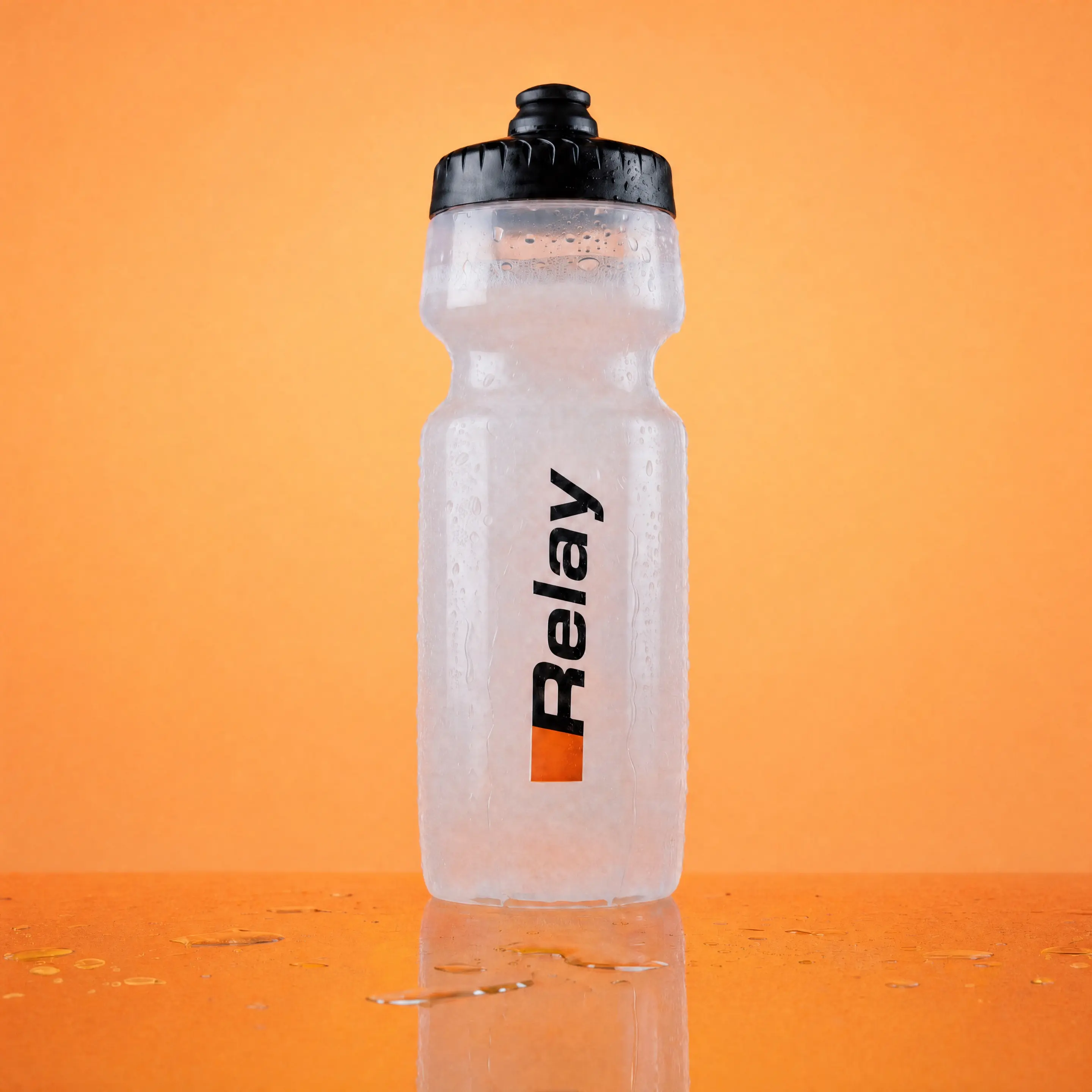Relay Training Bottle - 24 oz Clear Lightweight Squeeze Water Bottle with Black Flow Cap Relay Training Bottle - 24 oz Clear Lightweight Squeeze Water Bottle with Black Flow Cap