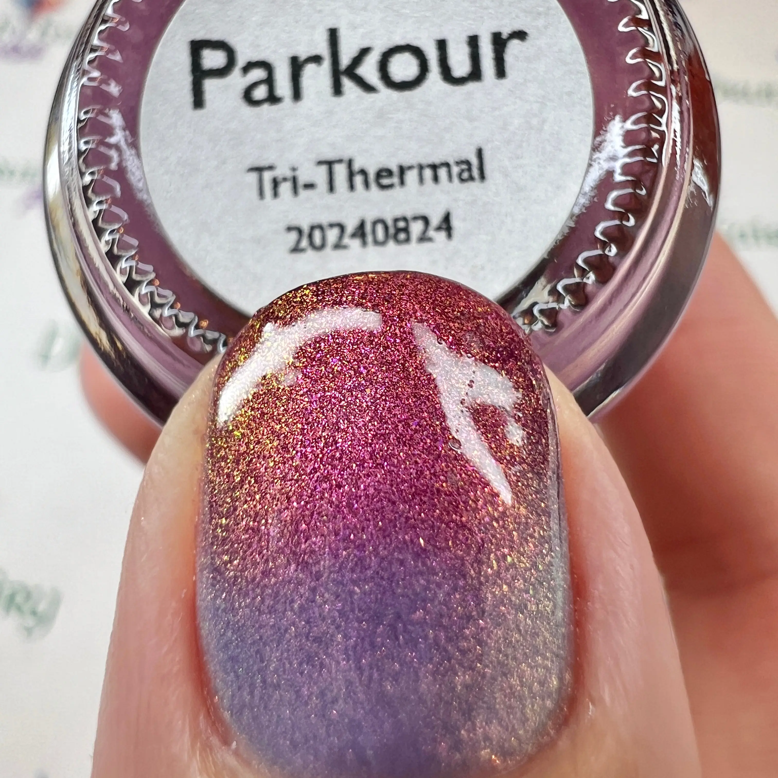 Parkour | A Tri-Thermal Nail Polish that Goes From Deep Brown Berry when Cold, to Warm Berry, to Light Purple When Warm