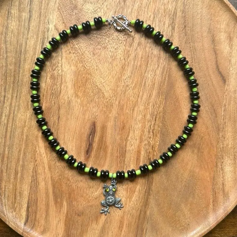 Black and green steampunk frog