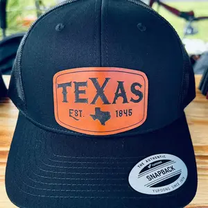 Texas Established 1845 Leather Patch on a Yupoong Snapback  Classic Hat